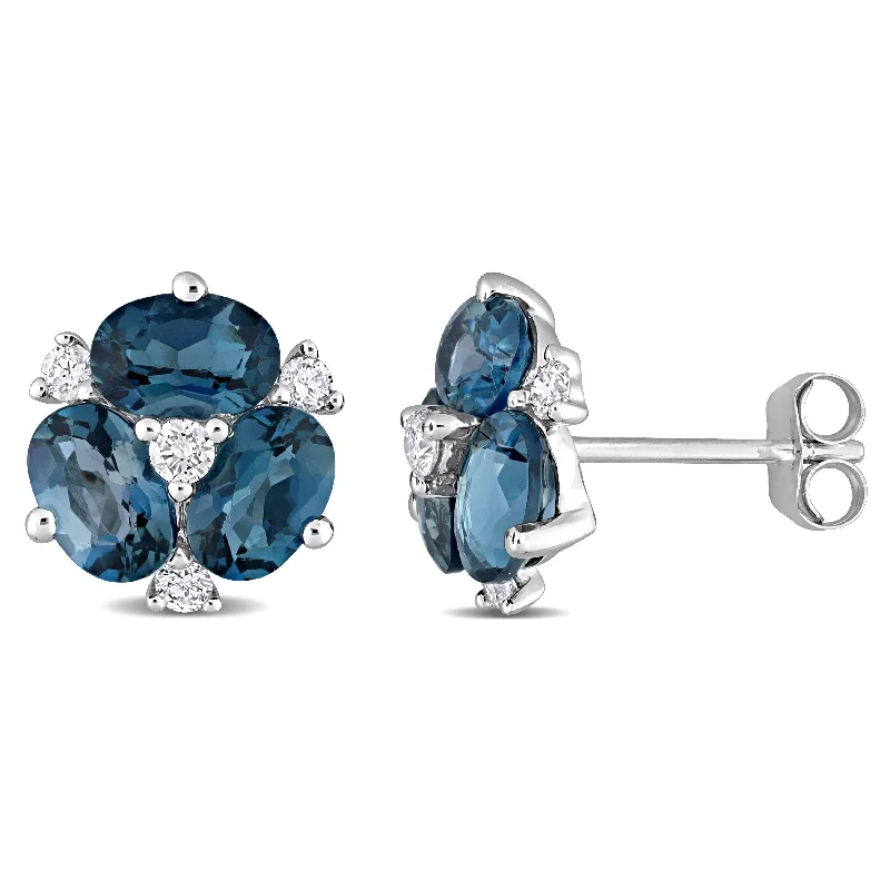 Miadora Oval-cut London-Blue Topaz and 1/5ct TDW Diamond Floral Stud Earrings in 14k White Gold